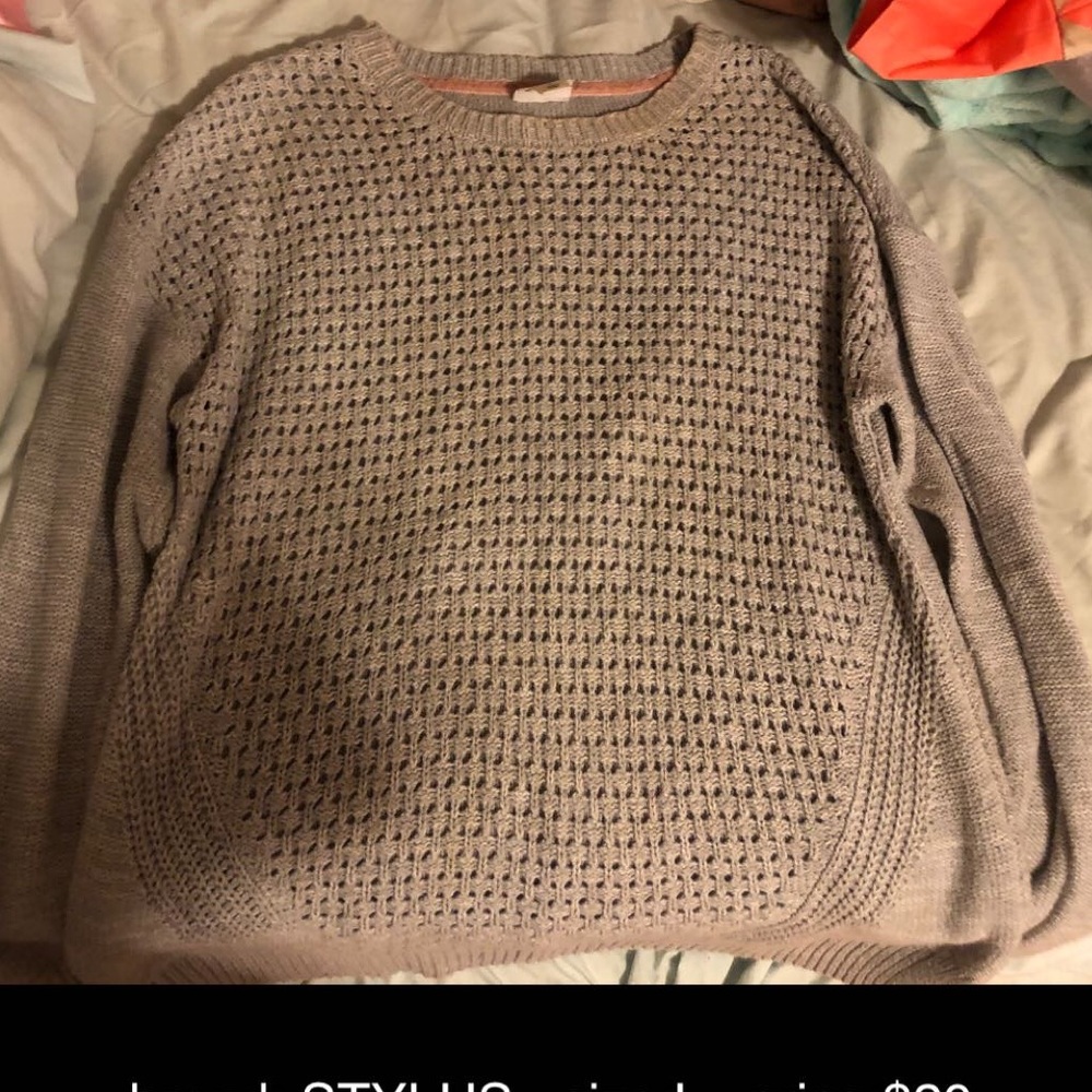 grey woman’s sweater